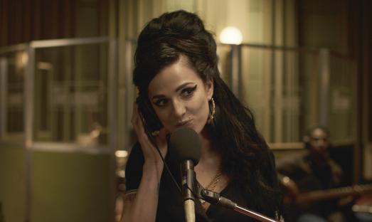 Marisa Abela as Amy Winehouse in a recording studio scene from