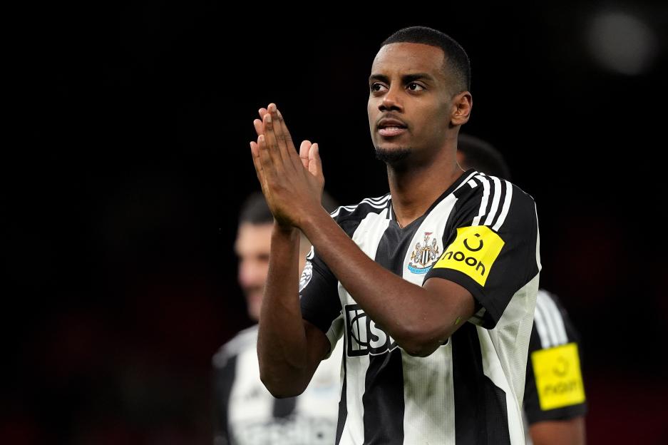 Alexander Isak of Newcastle United running on the field.