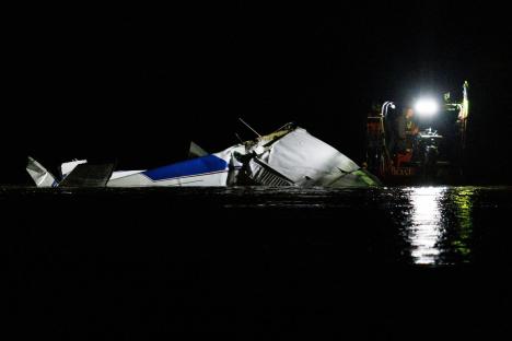 Three killed after plane crashes into Nebraska river with wreck pulled from water as mystery surrounds deadly disaster