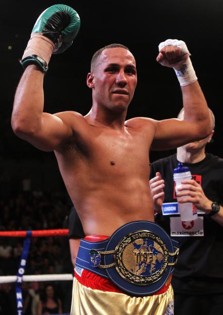 James DeGale celebrating victory with the European Super-Middleweight Championship belt.