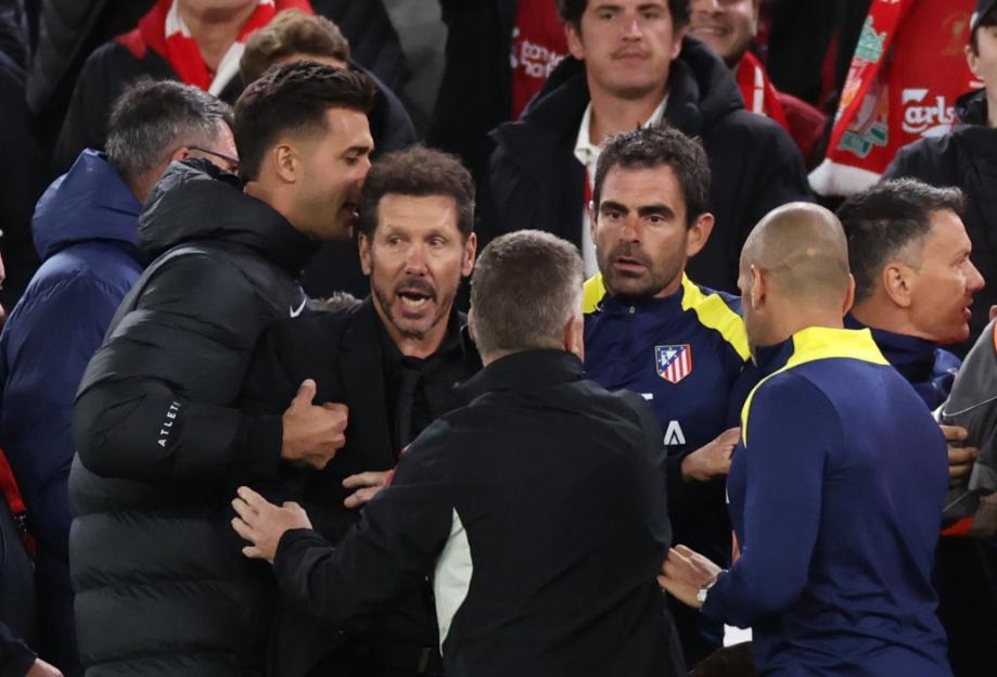 Atletico de Madrid staff and coaches reacting to a play during the UEFA Champions League 2025/26 League Phase match against Liverpool FC.