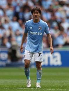 Tatsuhiro Sakamoto of Coventry City in his team's uniform.