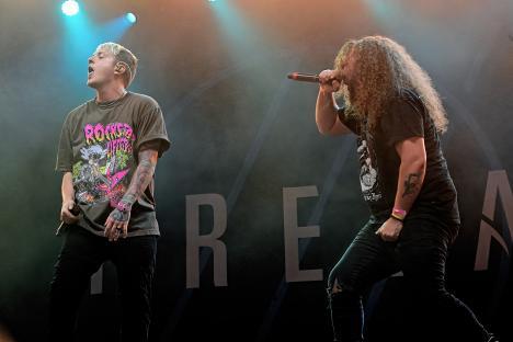 Brian Burkheiser and Eric Vanlerberghe of I Prevail performing at Pinkpop Festival.