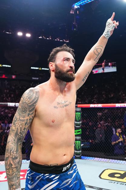 Paul Craig announcing his retirement after a UFC fight.