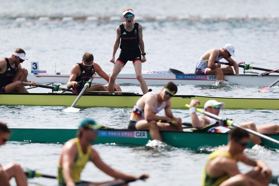 Great Britain's cox celebrating a gold medal win in men's eight rowing finals at the Paris 2024 Olympics.