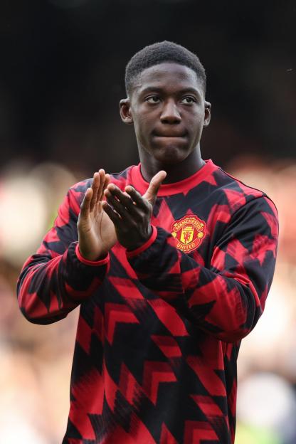 Kobbie Mainoo of Manchester United applauding fans.