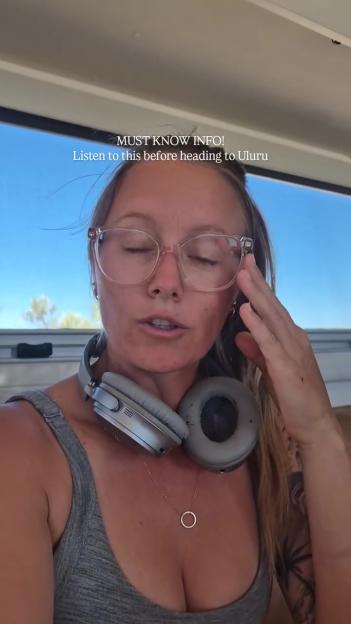 Woman giving Uluru travel advice.