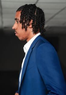 Man in a blue suit.