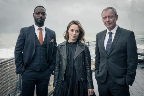 John Simm as DS Roy Grace, Richie Campbell as Branson, and Zoe Tapper as Cleo Morrey in Grace.