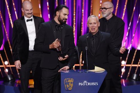 Rob Rinder and Rylan Clark accepting a BAFTA Television Award.