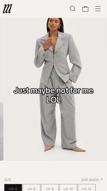 Image of a woman wearing a light gray oversized suit with the text "Just maybe not for me LOL".