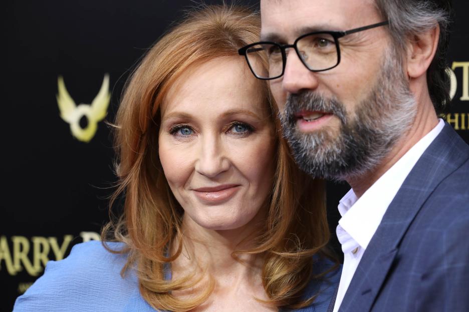 J.K. Rowling and Neil Murray at an event.