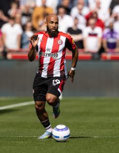 Bryan Mbeumo of Brentford FC dribbling the soccer ball.