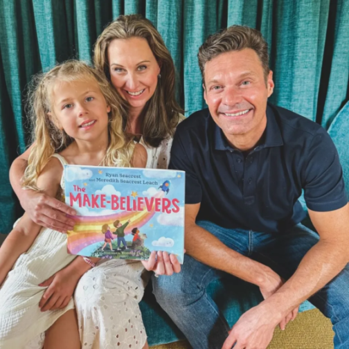 Ryan Seacrest, Meredith Seacrest Leach, and a child holding "The Make-Believers" book.