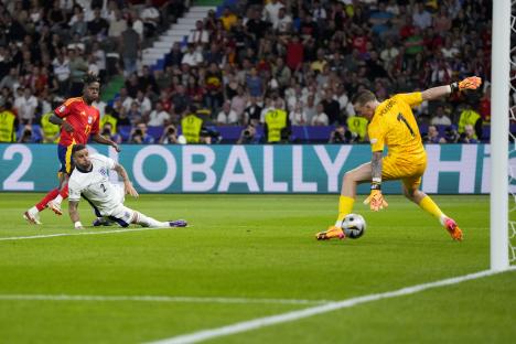 Spain's Nico Williams scoring a goal during a soccer match.