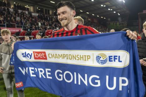 Kieffer Moore holding a