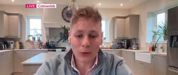 Screenshot of a man in a kitchen giving a live interview from the Cotswolds.