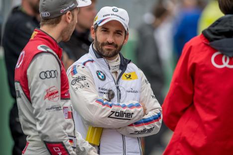 Timo Glock and Rene Rast talking before a DTM race.
