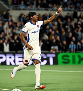 Noni Madueke of Chelsea celebrating a goal.