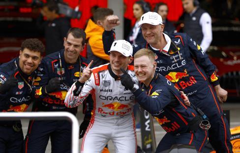 Max Verstappen celebrates his Japanese Grand Prix win with the Red Bull team.