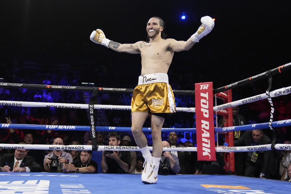 Nico Ali Walsh celebrates after defeating Alejandro Ibarra.