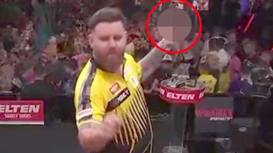 Darts star Scott Williams risks fine after giving fans middle finger during German Grand Prix