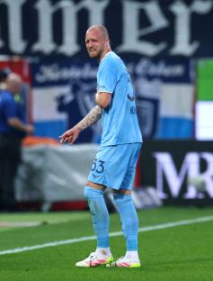 Philipp Hofmann of VfL Bochum reacts to an injury during a soccer match.