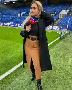 Sky Sports presenter Melissa Reddy at a soccer stadium.