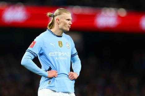 MANCHESTER, ENGLAND - MARCH 01: Erling Haaland of Manchester City looks on during the Emirates FA Cup Fifth Round match between Manchester City and Plymouth Argyle at Etihad Stadium on March 01, 2025 in Manchester, England. (Photo by Chris Brunskill/Fantasista/Getty Images)