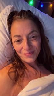 Davina McCall in bed after brain surgery.