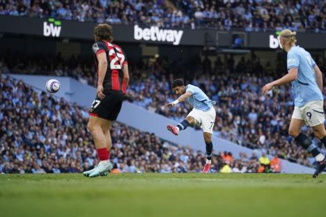 Omar Marmoush scoring a goal for Manchester City.