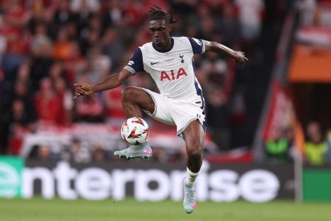Yves Bissouma of Tottenham Hotspur controls the ball during a soccer match.