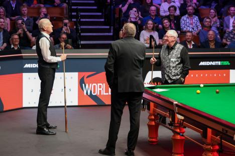 Steve Davis and Dennis Taylor at a snooker exhibition.