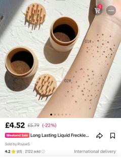 Long-lasting liquid freckle product with applicator.