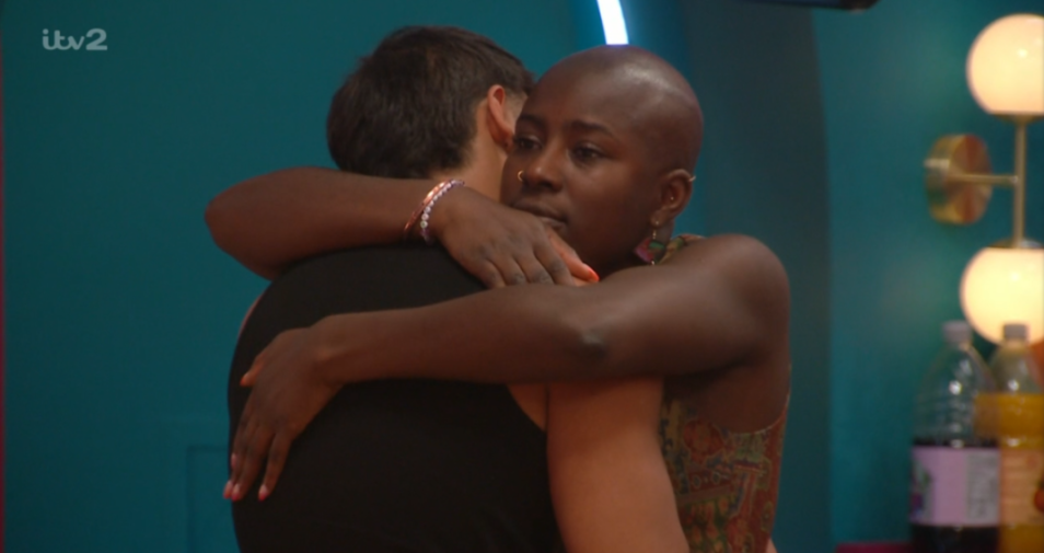 Big Brother contestant Zelah hugging a housemate.