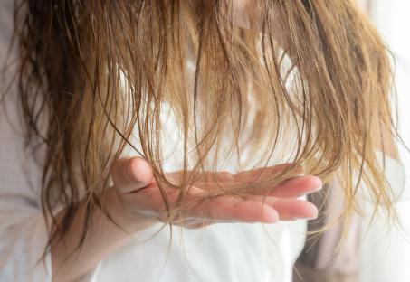 Close-up of damaged, dry hair.