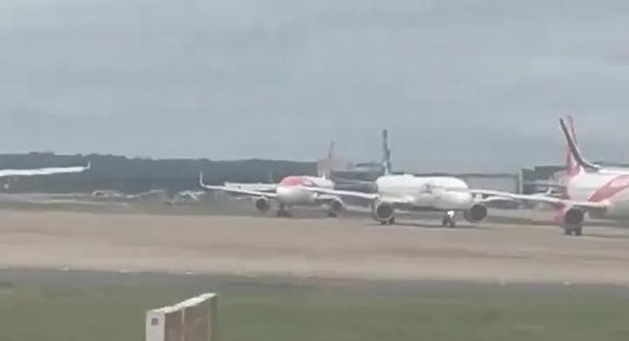 Planes on a tarmac.