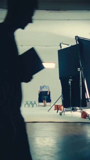 Behind-the-scenes photo of Cheryl Cole during a photoshoot.