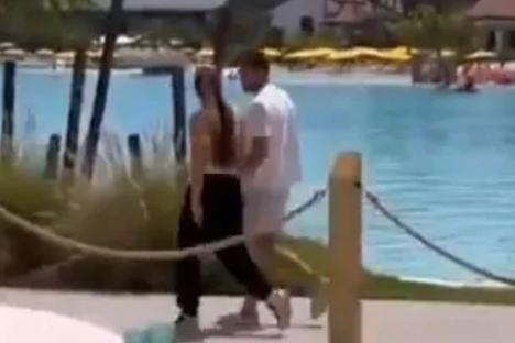 JoJo Siwa and Chris Hughes spotted holding hands at  Disneyworld in biggest hint yet that they’re secretly dating