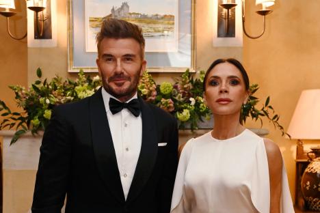 Victoria Beckham gives husband David a massage as they show off funny side amid bitter family feud