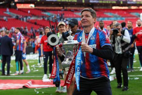 Oliver Glasner, Crystal Palace manager, holding the FA Cup trophy.