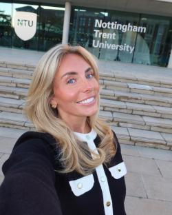 Woman in front of Nottingham Trent University.