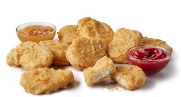 Chicken McNuggets with honey mustard and ketchup.