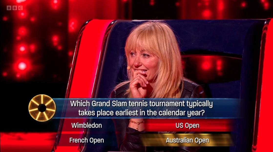 A contestant on "The Wheel" considers a tennis question.