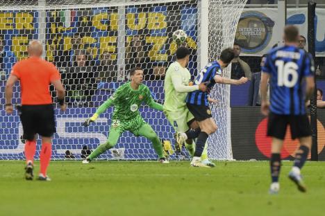 Francesco Acerbi scoring a goal during a soccer match.