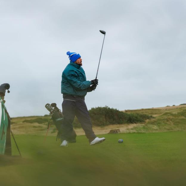 Justin Bieber playing golf at St. Andrews.