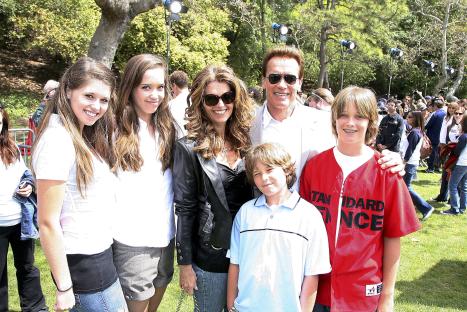 Arnold Schwarzenegger and Maria Shriver with their four children at a softball game.