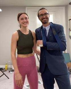 Joe Wicks and Rosie Jones posing together.