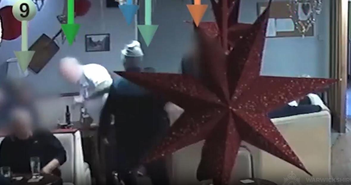 Blurry CCTV image of a pub incident.