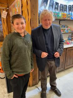 Boris Johnson with a young boy.